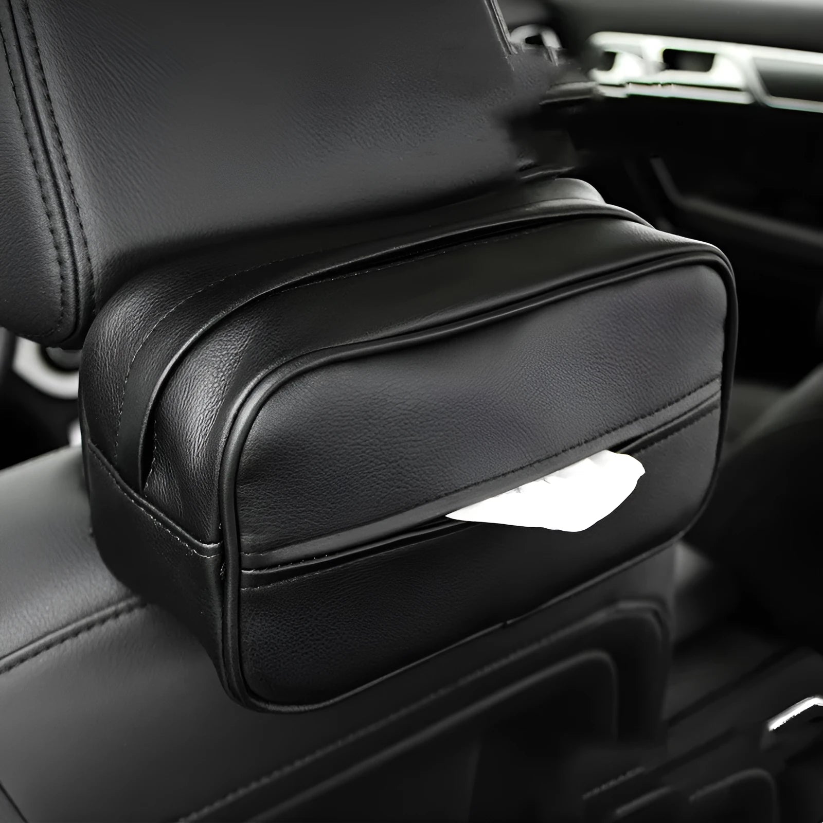Black leather hanging storage box with strap handles for car and home organisation
