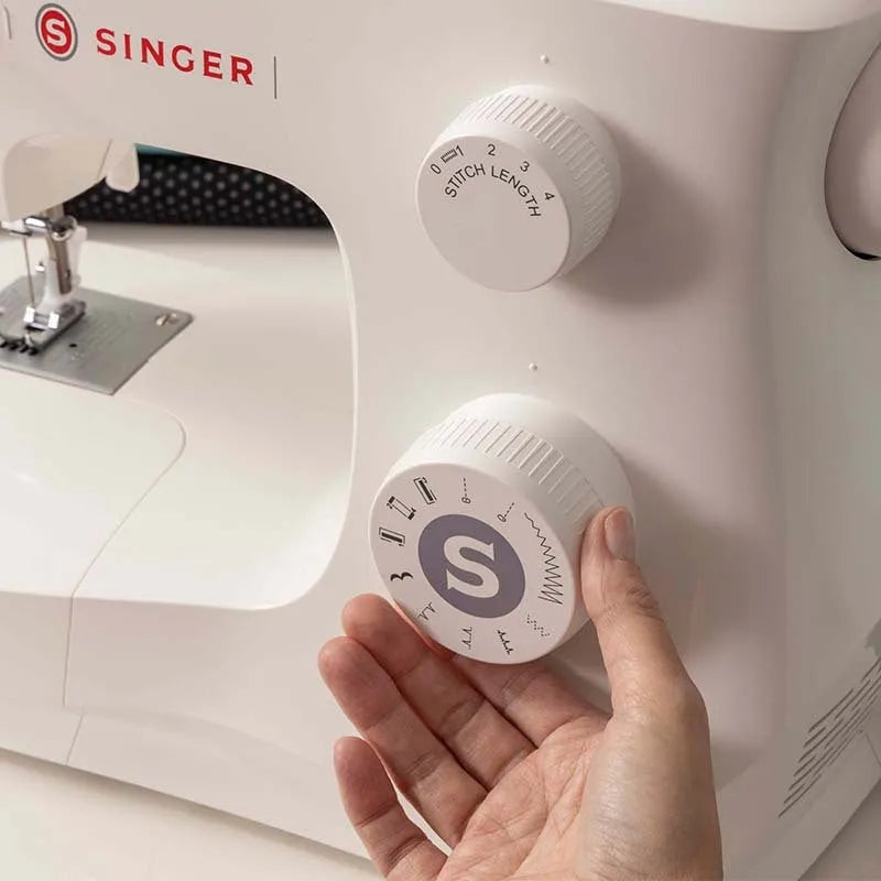 M2405 portable household sewing machine with accessories on white background