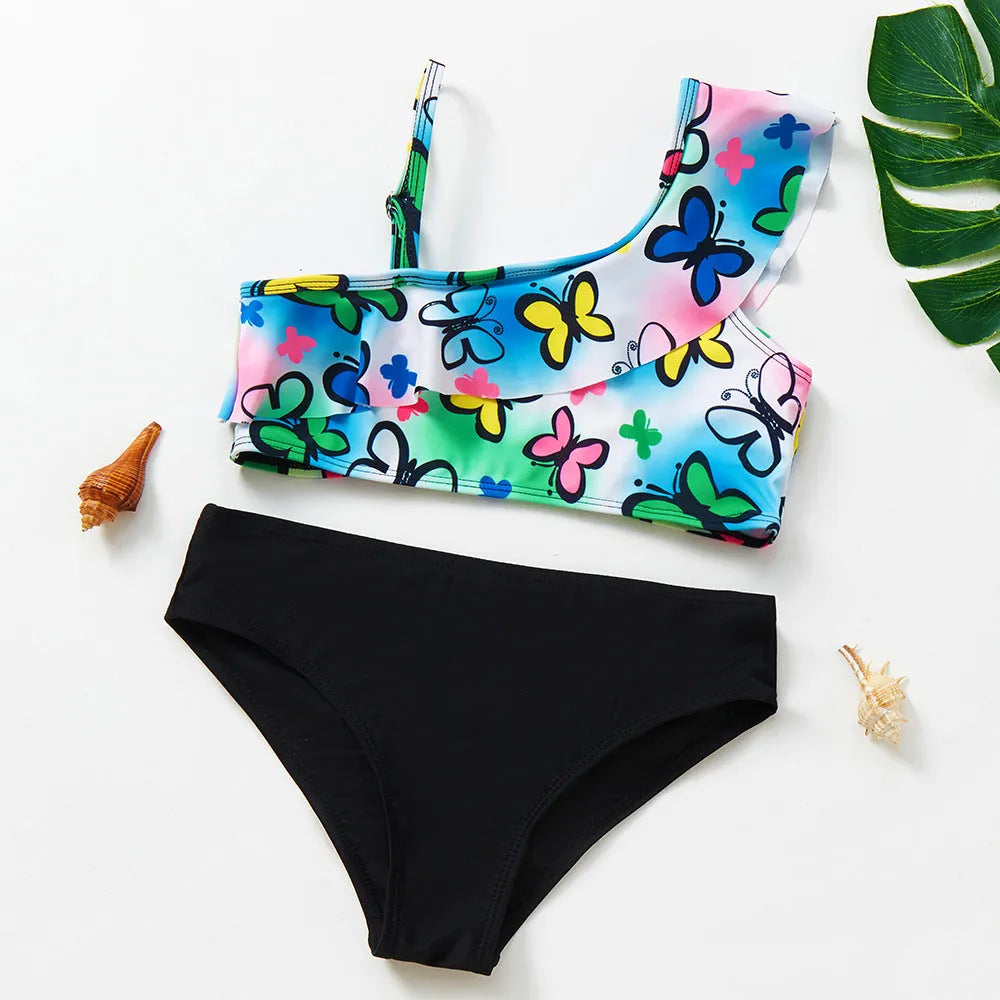 Girls' two-piece swimsuit with oblique shoulder strap, split design, polyester fabric, in butterfly, graffiti, or lemon yellow.