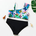 Girls' two-piece swimsuit with oblique shoulder strap, split design, polyester fabric, in butterfly, graffiti, or lemon yellow.