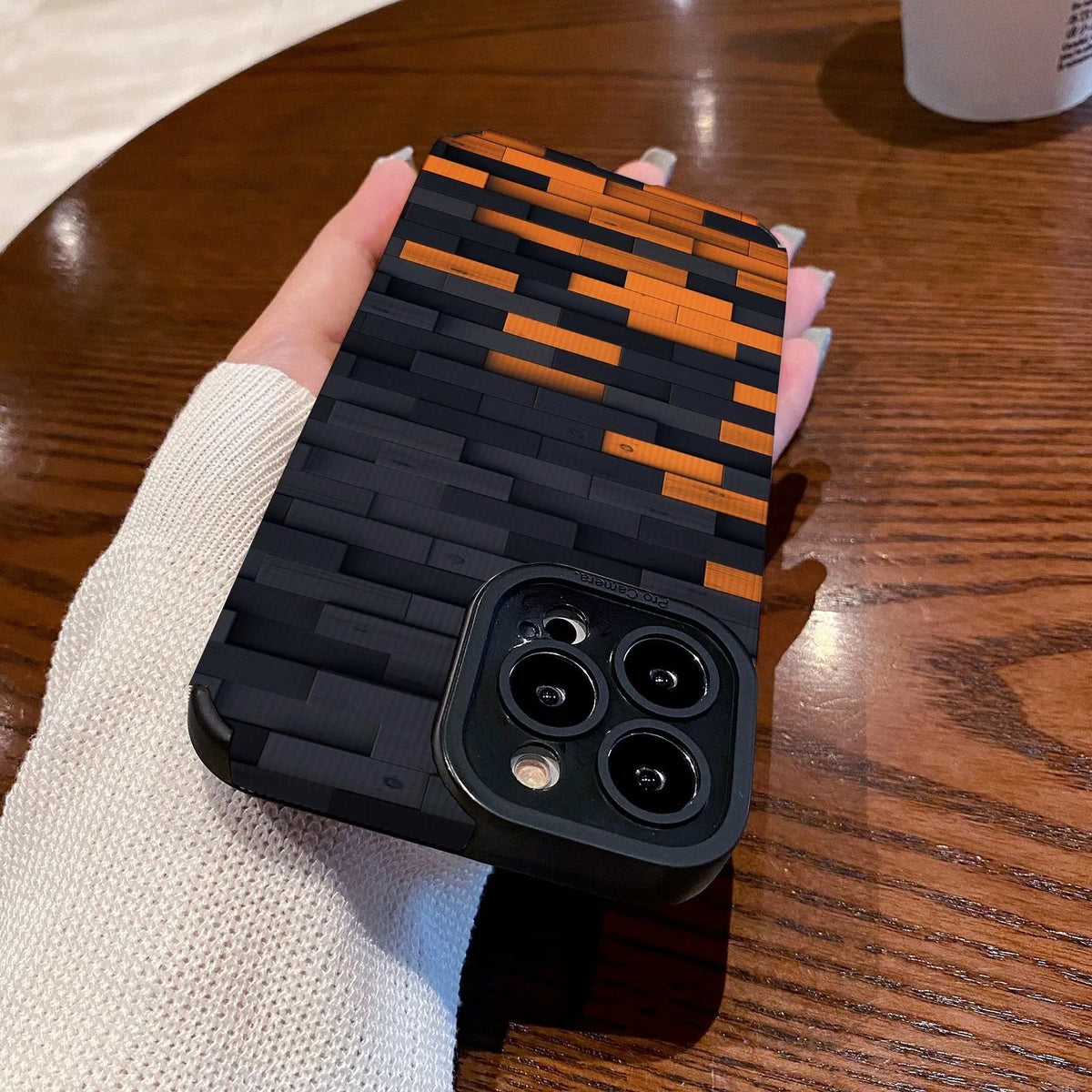 Orange and black cartoon phone case with stitching, all-inclusive soft leather for iPhone