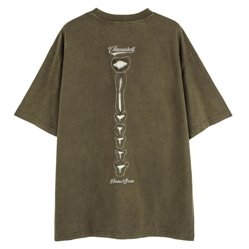 Loose fit black cotton t-shirt with skull and letter print, featuring drop-shoulder short sleeves.