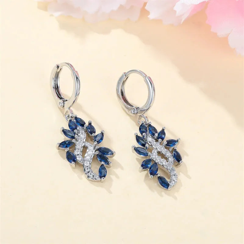 Women's simple minority style alloy earrings with platinum sapphire blue finish