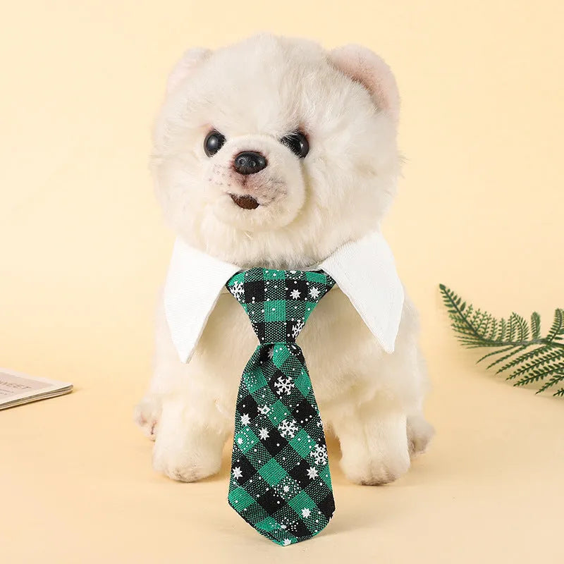 Christmas dog necktie with red plaid snowflake pattern on a small dog for festive wear