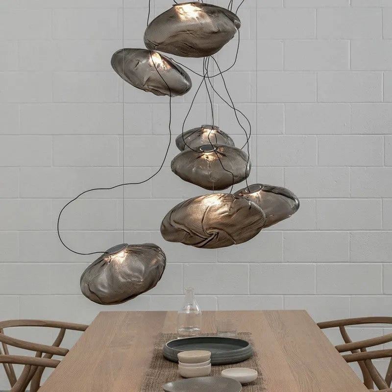 Modern glass fabric chandelier in amber, clear, or smoke grey, available in 200mm and 300mm sizes.