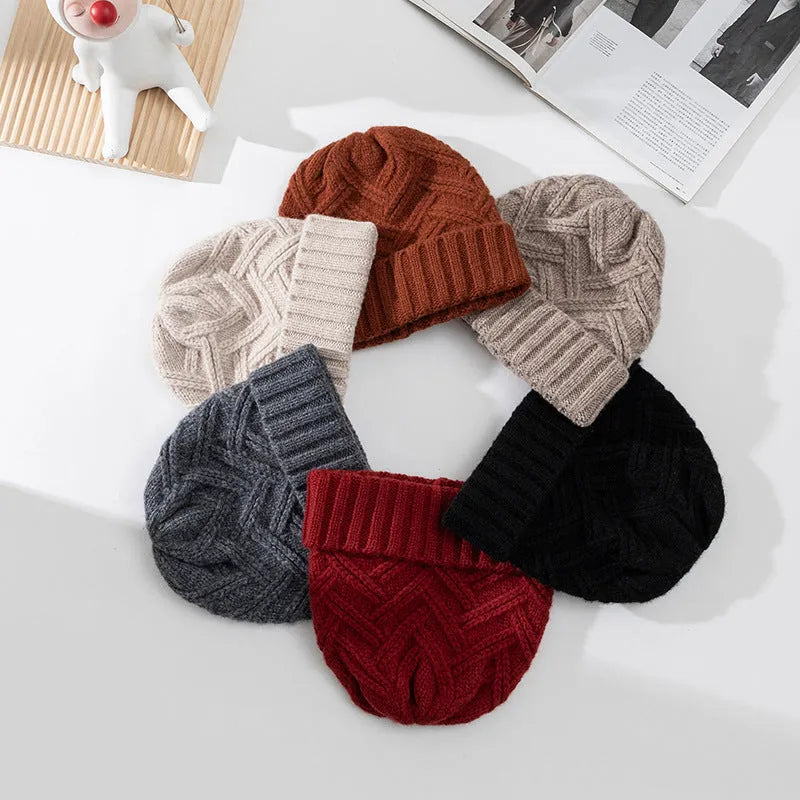 Women's wool knitted dome crown winter hat with a totem pattern, shown in one of six available colours.