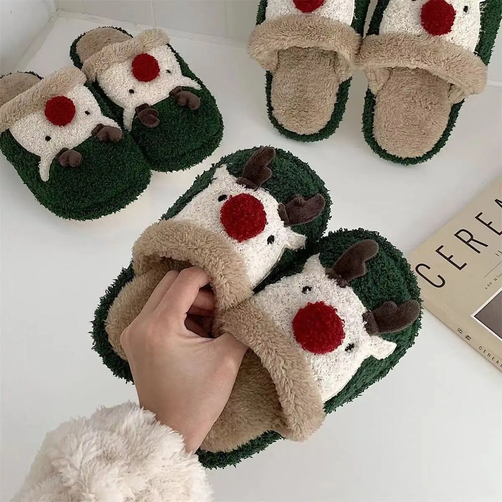 Women's green Christmas deer cotton plush slippers with non-slip PVC soles.