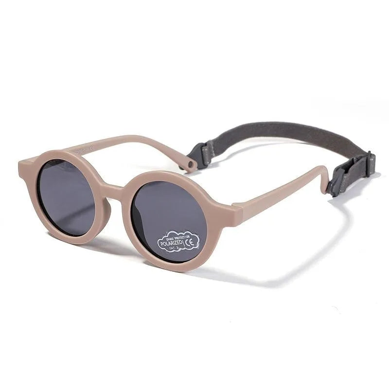 Children's silicone sunglasses for 0-3 year olds with round frame and polarized lenses in multiple colour options