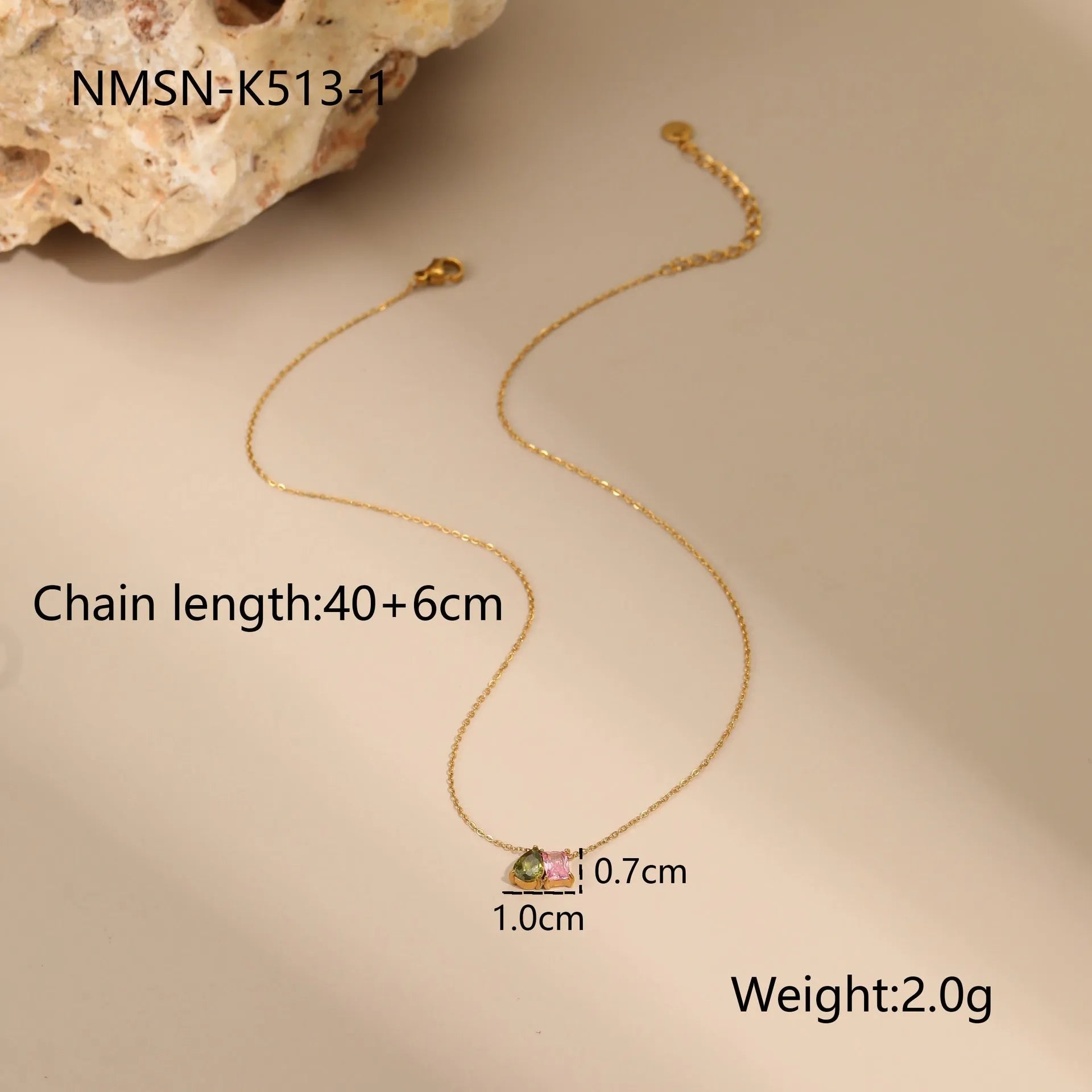 Geometric gold plated jewellery set with necklace, ring, and earrings on stainless steel chain