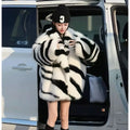 Women's zebra stripe skimmer collar top with long sleeves in polyester fur fabric