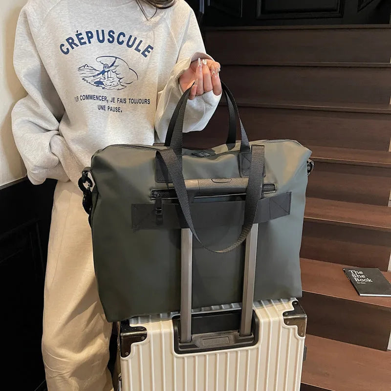 Lightweight Oxford cloth tote bag in black, grey or champagne with 20-35 litre capacity for business travel