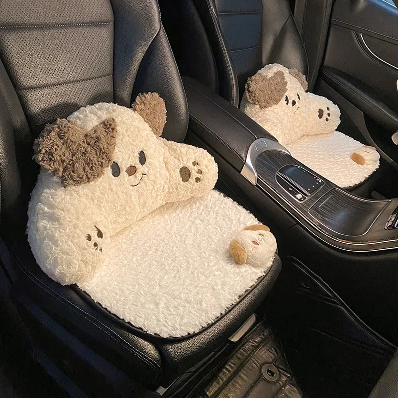 Puppy plush car headrest cushion and matching lumbar support pillow on a car seat.