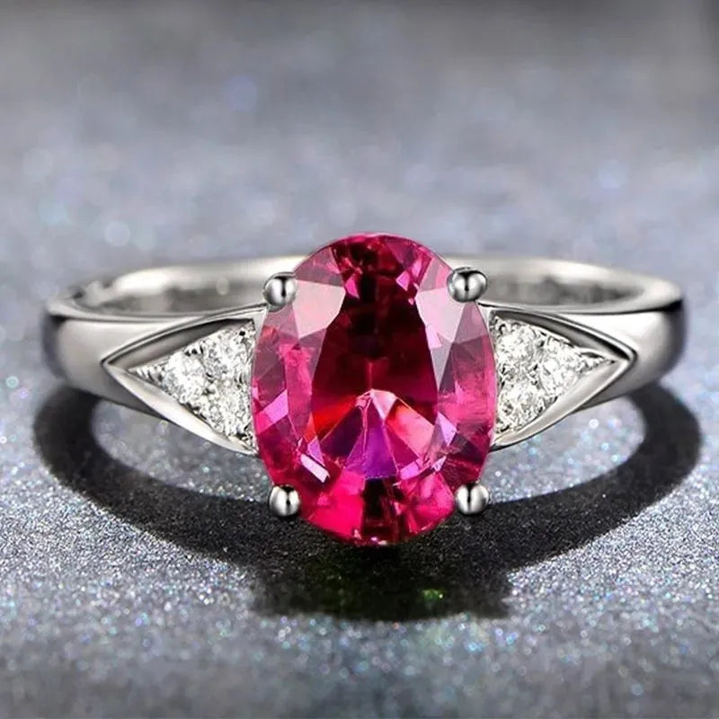 Women's zircon ring with heart pattern blue zircon stone on court style band.