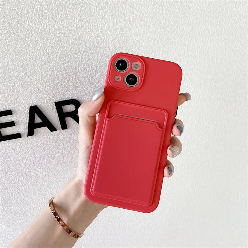 Sky blue colour block silicone iPhone case with a visible card slot on the back.