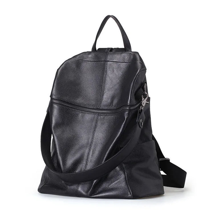 Genuine leather women's retro backpack showing sewing thread details and sandwich pocket