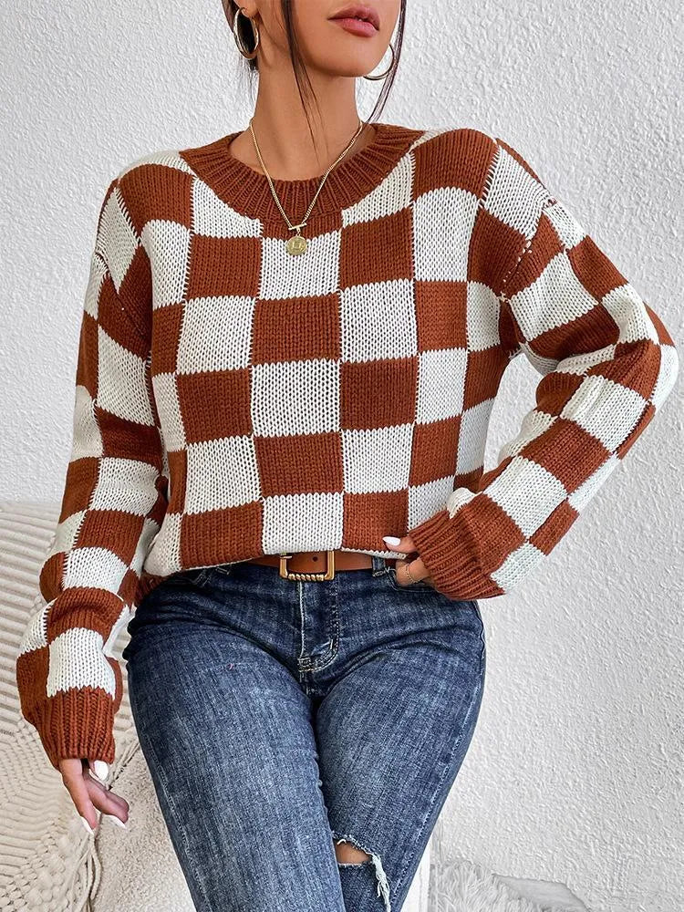 Dark brown plaid women's loose pullover sweater with round neck and long sleeves.