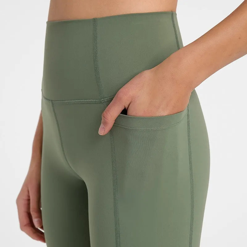 Women's tight-fitting super stretch sports shorts in grey lake green, short length for running.