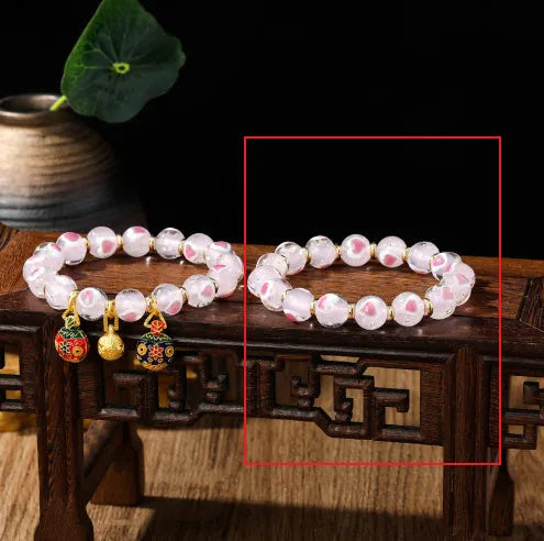 Handmade heart-shaped glass bracelet with swallowing gold beast pattern in ancient fluorescent glaze