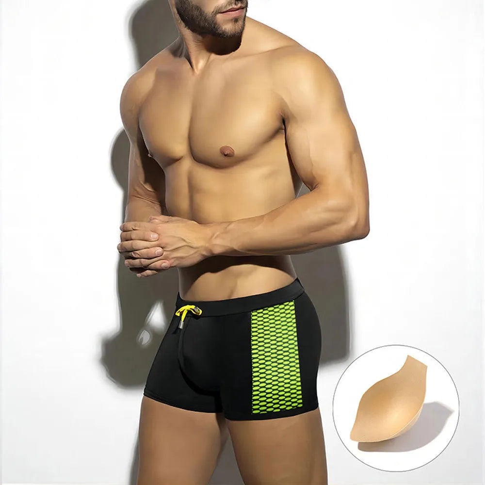 Men's polka dot print swimming boxers in nylon, shown in black, dark blue, and yellow colour options.
