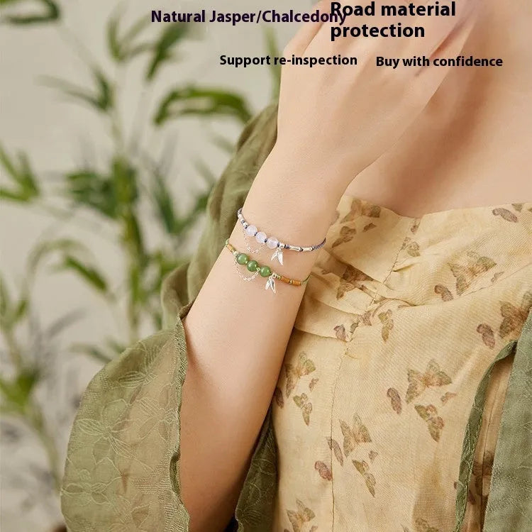 Hetian jade diamond-shaped bracelet with woven carrying strap and lotus seedpod detail