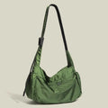 Nylon waterproof messenger bag in black with single shoulder strap and horizontal square design