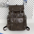 Solid colour PU couple travel backpack in black, curved shoulder strap, waterproof design for leisure travel