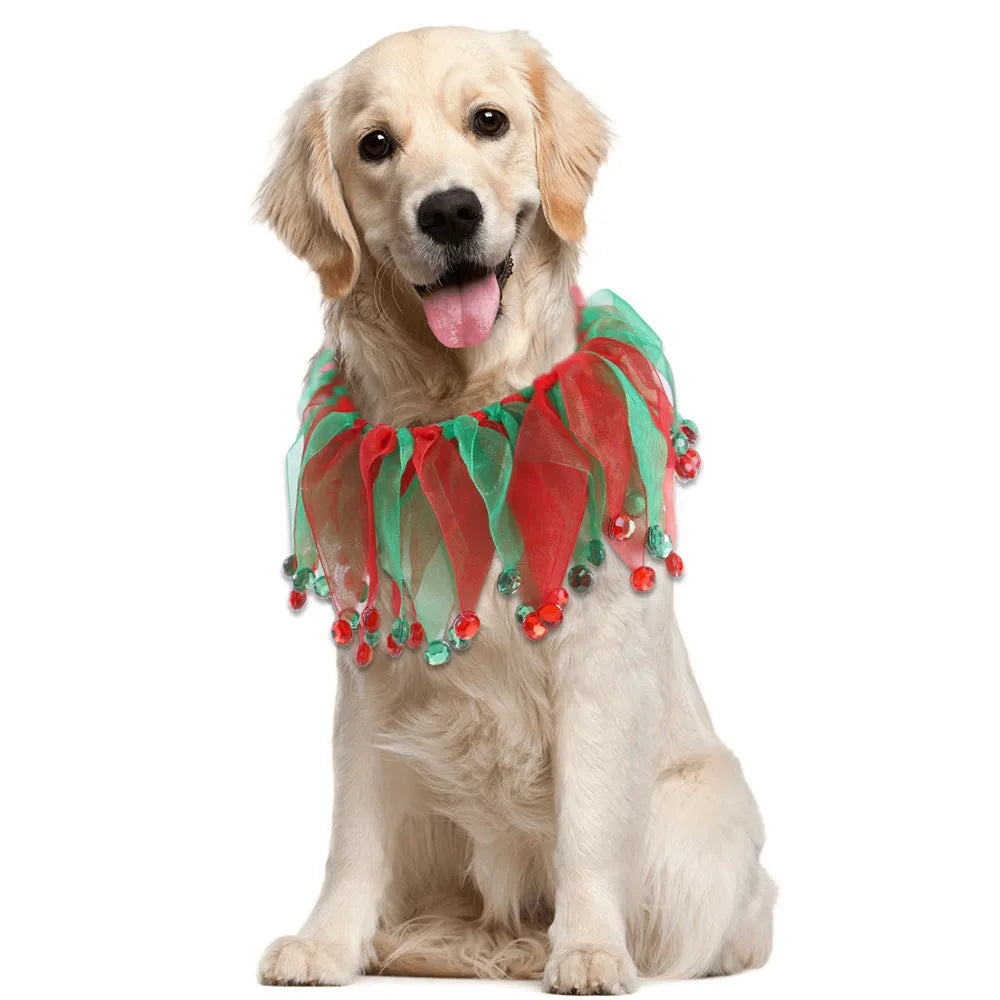 Colourful tie-dye dog collar on a white background showing blue, green, Halloween and Christmas patterns.