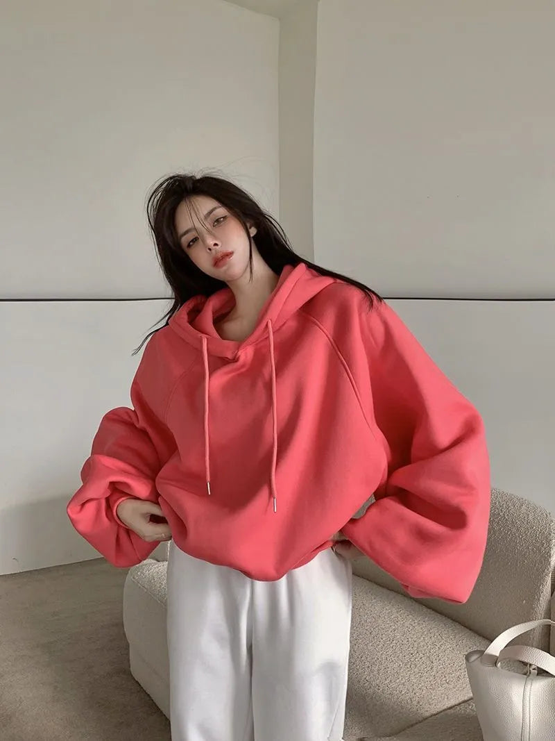 Watermelon red women's sleeveless hooded sweater made from loose-fitting Mulberry silk.