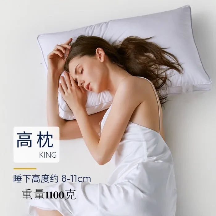 White cotton satin stripe feather pillow showing simple design and hotel-style aesthetic