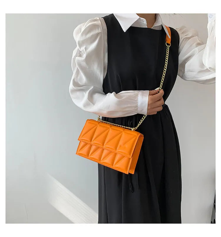 Small square crossbody shoulder bag in PU leather with chain and shoulder strap, available in five colours, 22cm width