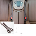 Two polyresin car seat gap sealing strips in chosen colour, shown next to a vehicle seat.