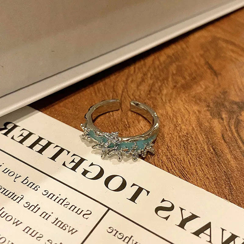 Copper butterfly women's ring with dripping oil texture and an open loop design.