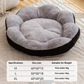 Round grey and black plush cat bed with a raised rim and a removable inner nest, shown on a wooden floor.