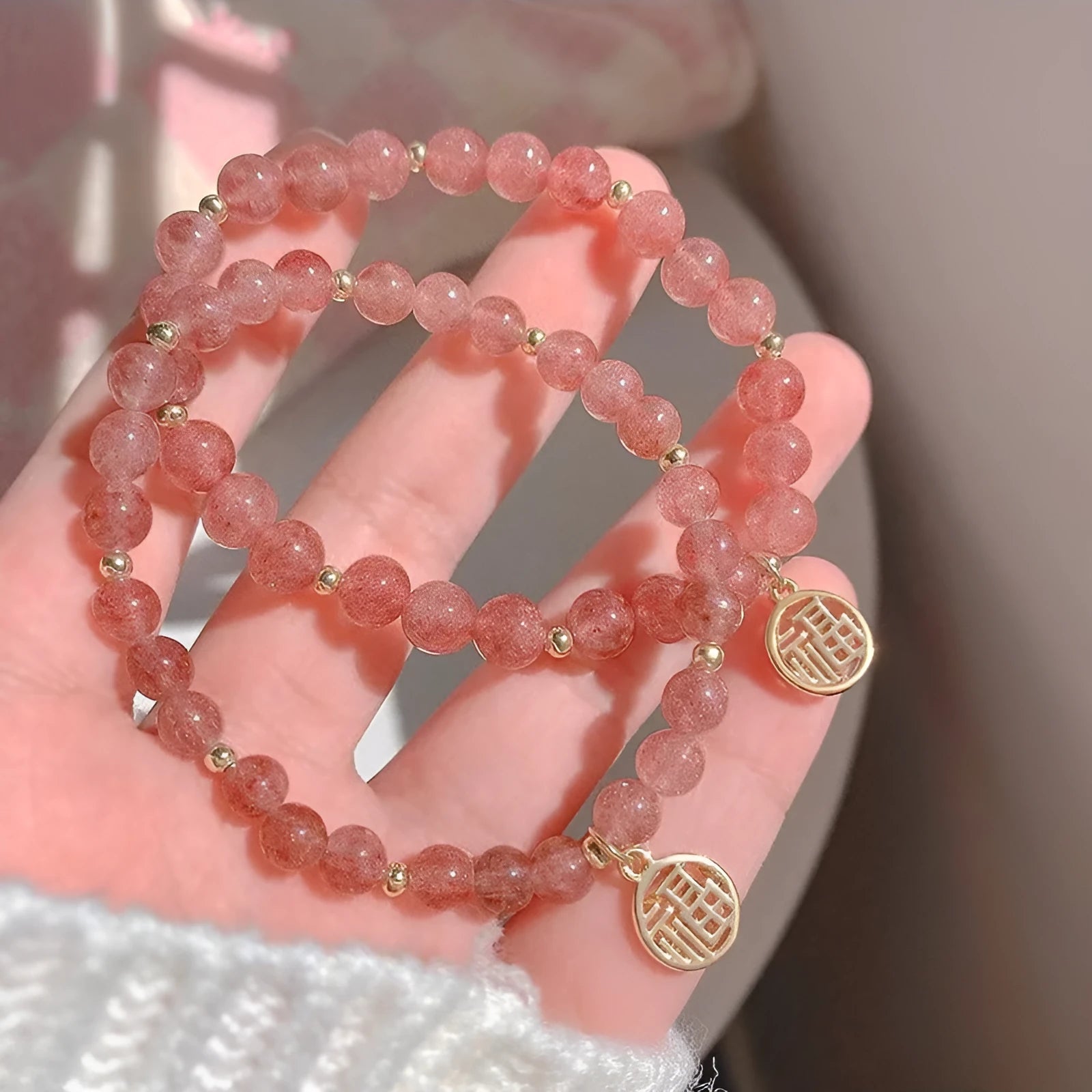 Handmade women's glass bracelet with strawberry quartz beads and blessing card