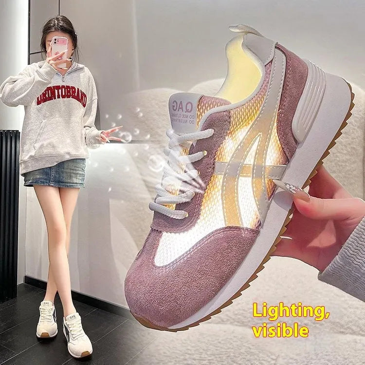 Women's white low-top lace-up sneakers with round toe and plastic sole