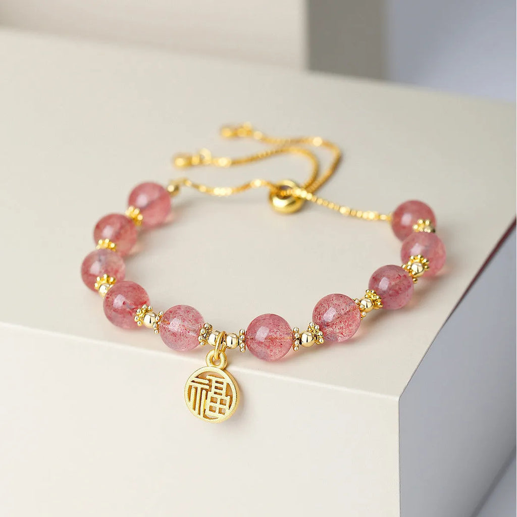 Strawberry quartz crystal bracelet with geometric fu character design and electroplated finish