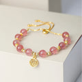 Strawberry quartz crystal bracelet with geometric fu character design and electroplated finish