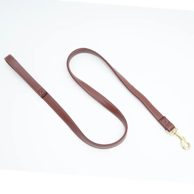 Black high-grade PU leather dog traction belt with a metal ring, shown alongside its attached rope.