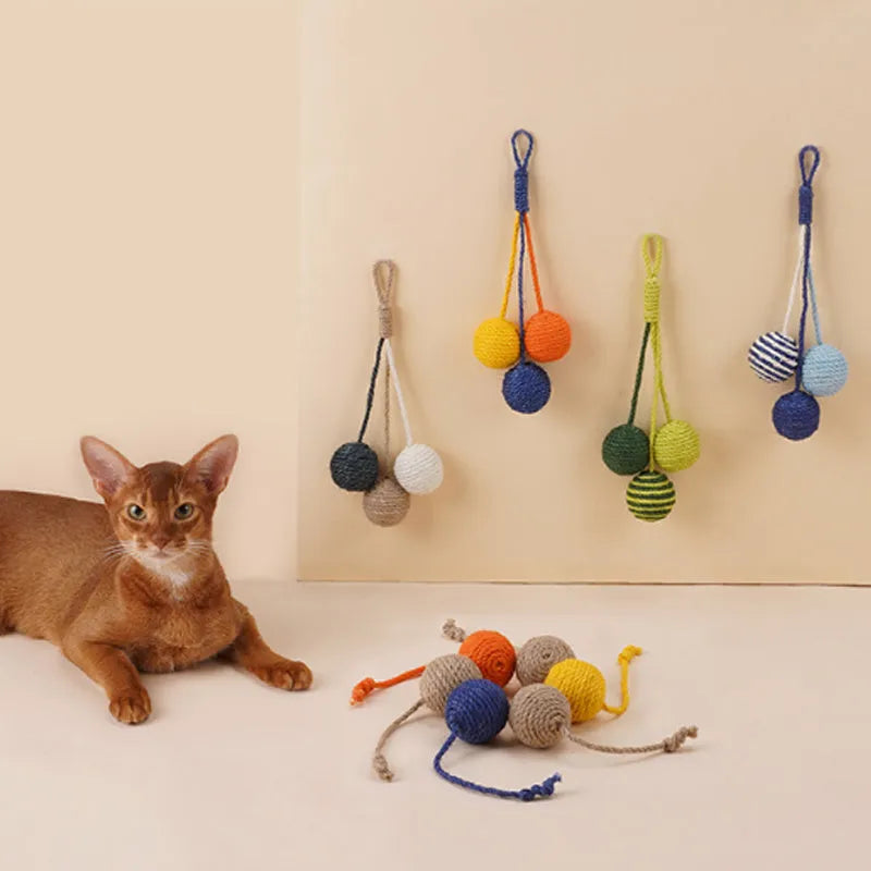 Cat toy set showing bite-resistant teaser wand and catnip ball in multiple colour variations