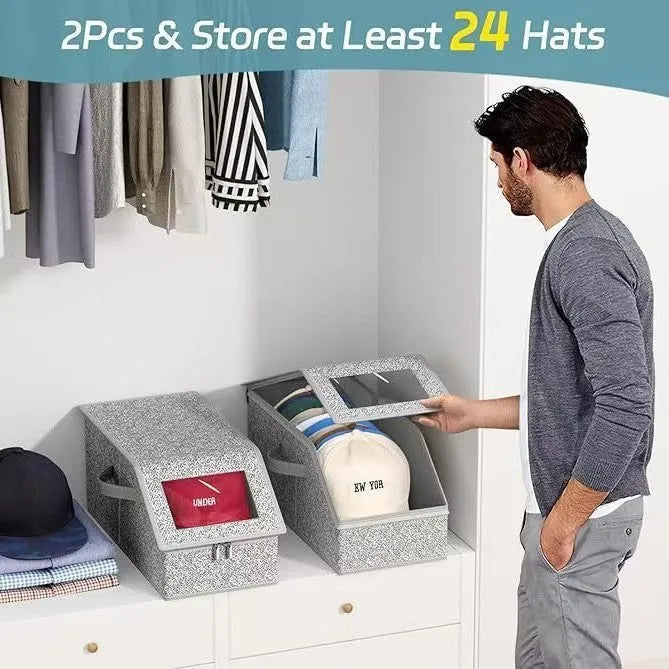Grey foldable woven fabric storage box with lid, shown next to baseball caps.