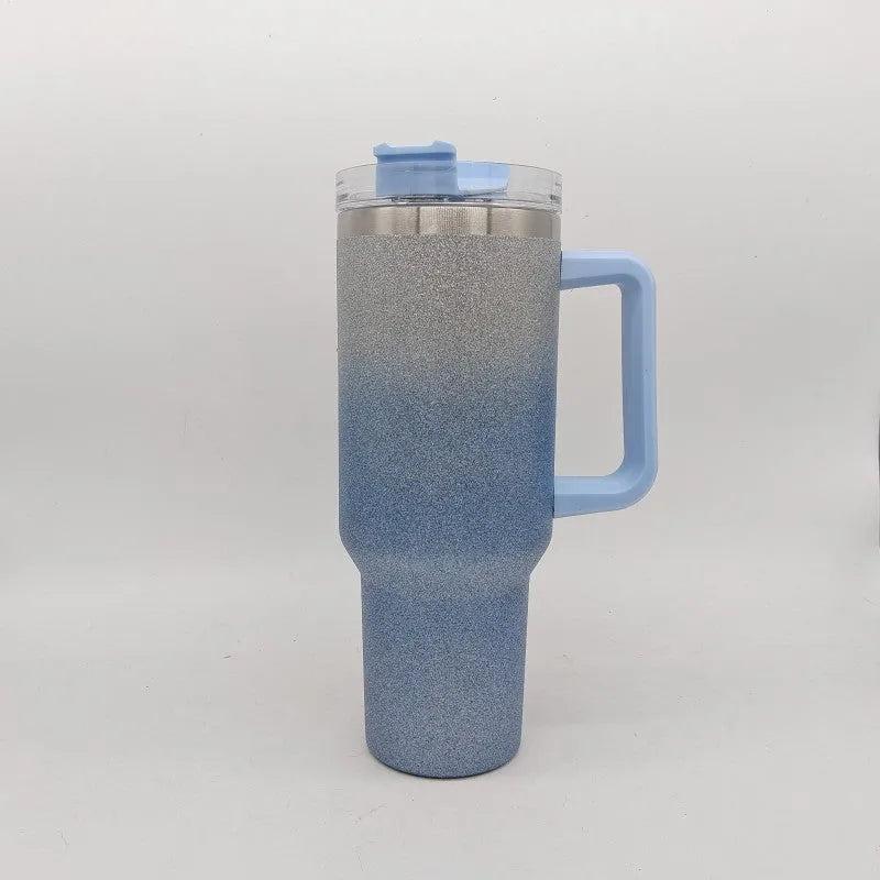 Stainless steel vacuum insulation cup in rainbow gradient colours showing double-layer construction