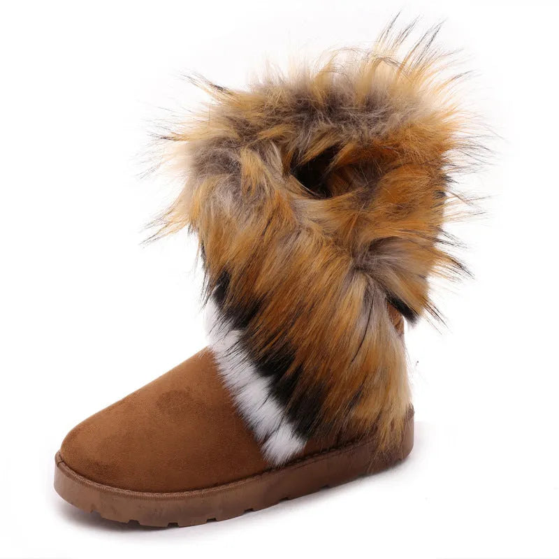 Women's winter snow boots with suede upper, fluffy fox fur trim, and non-slip rubber sole in black colour