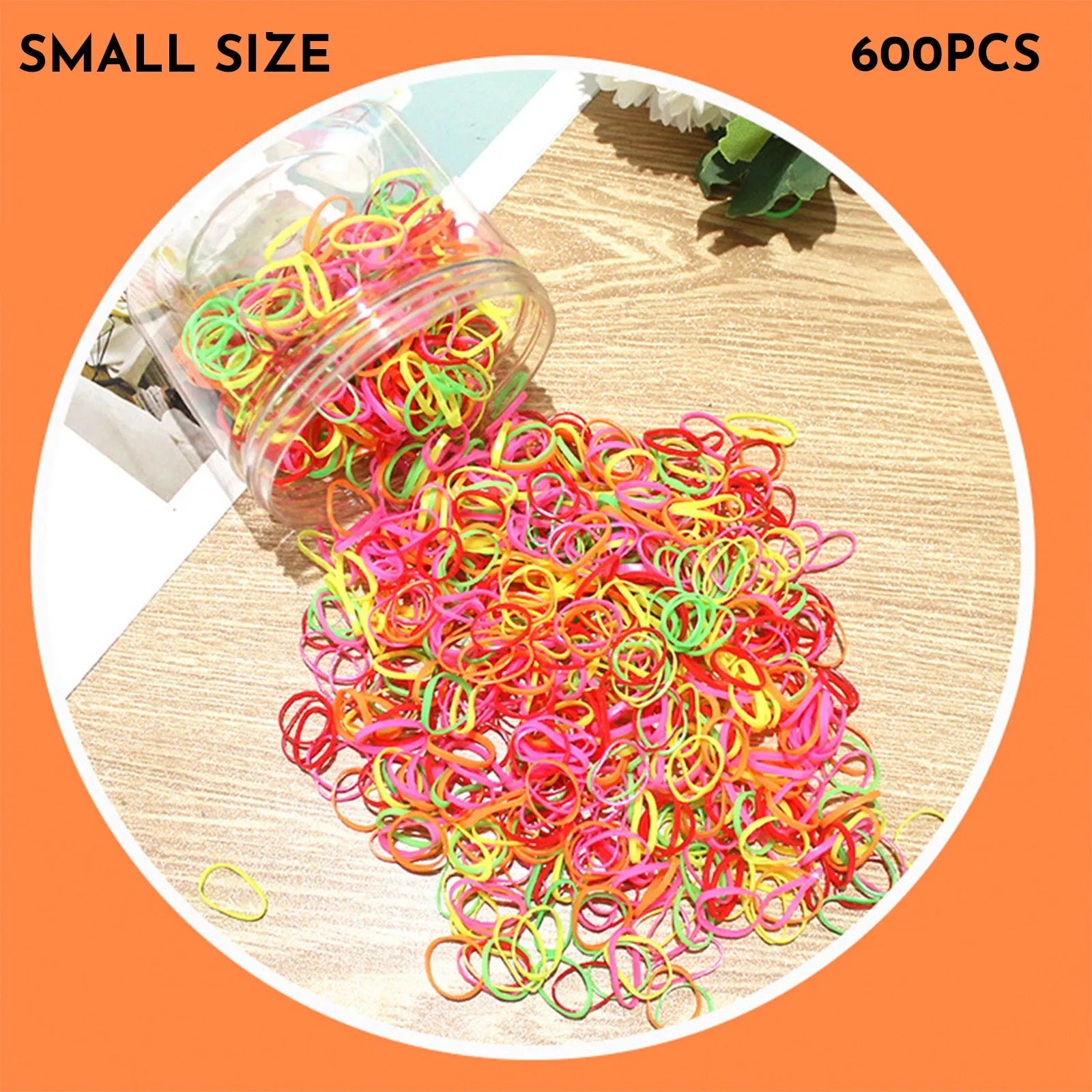Assorted colourful TPU baby hair ties in a reusable plastic container.