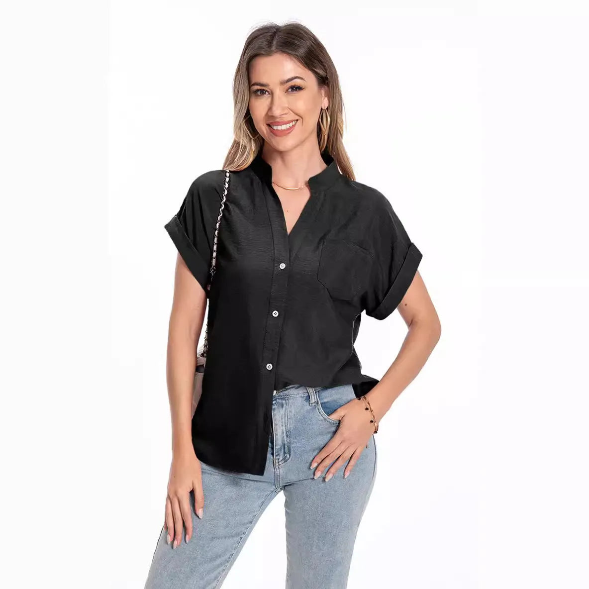 Women's stand collar button front short sleeve top in loose fit polyester with raglan sleeves