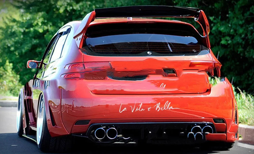 La E Bella reflective car sticker in black, 40x8cm, placed on a car door panel