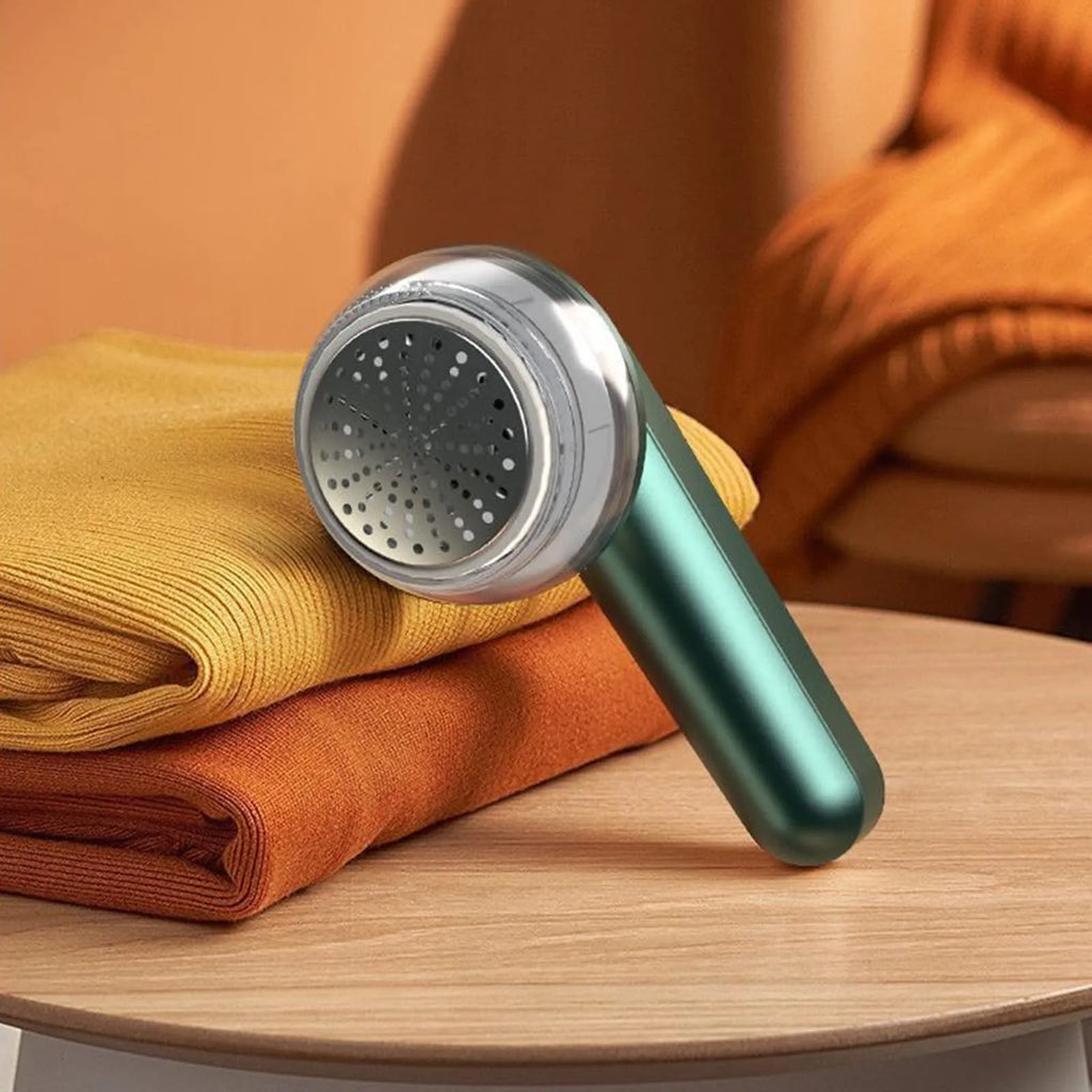 White or green USB-rechargeable electric lint remover with removable lint collection container