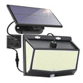 468LED separate-body solar wall light with motion sensor on brick wall