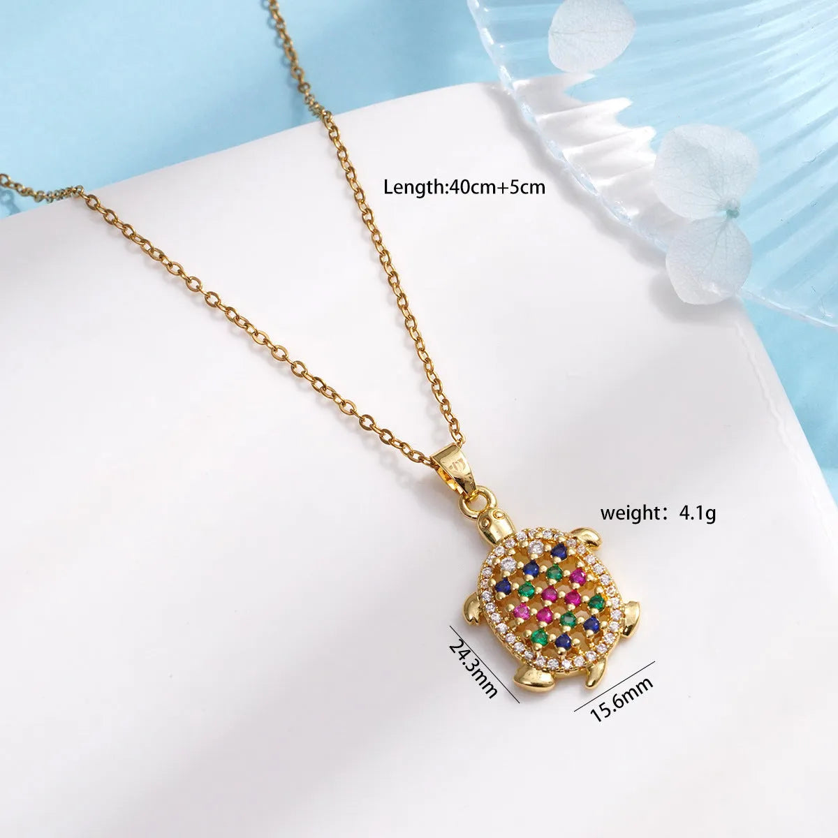 Gold-plated copper sea turtle necklace with zirconium accents and mixed gemstone inlay, O-link chain, light luxury style for women
