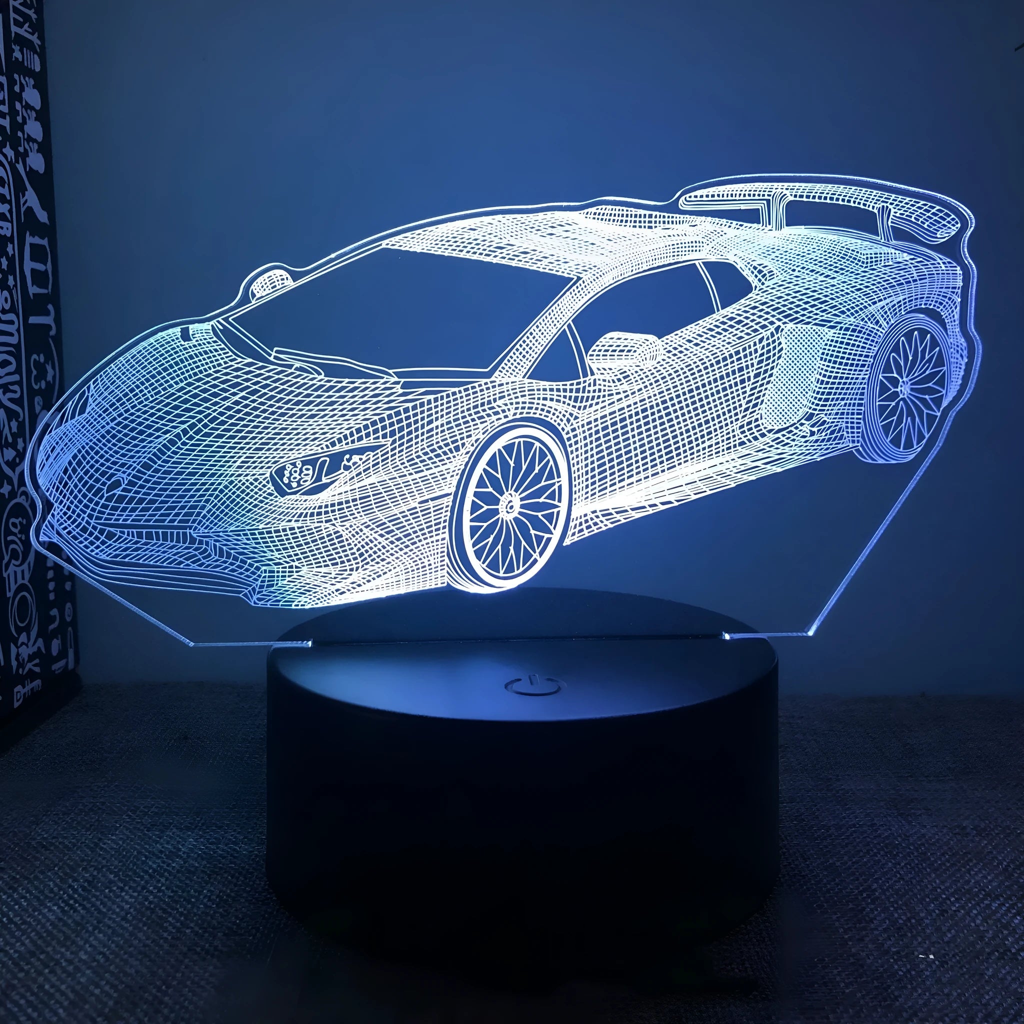 Car-shaped bedside lamp with remote control showing 16 colour lighting options