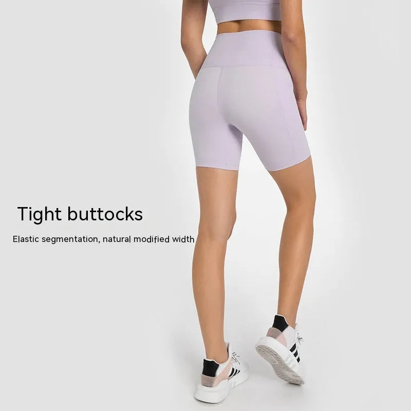 Women's tight-fitting super stretch sports shorts in grey lake green, short length for running.